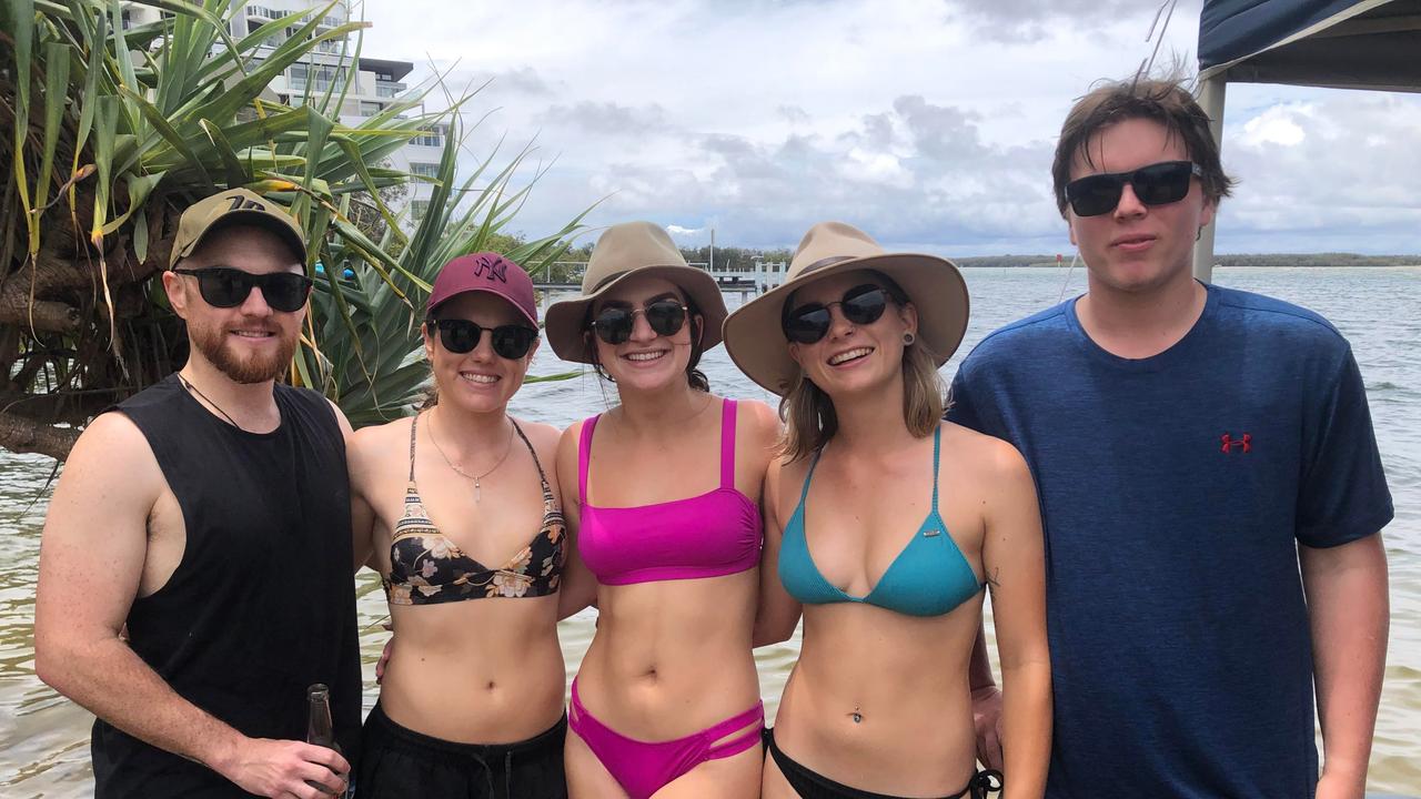 Jae and April Harvey, Caysea Carey, Codey Madden and Caylen Bartz enjoy Christmas celebrations at Cotton Tree Park. Picture: Laura Pettigrew.