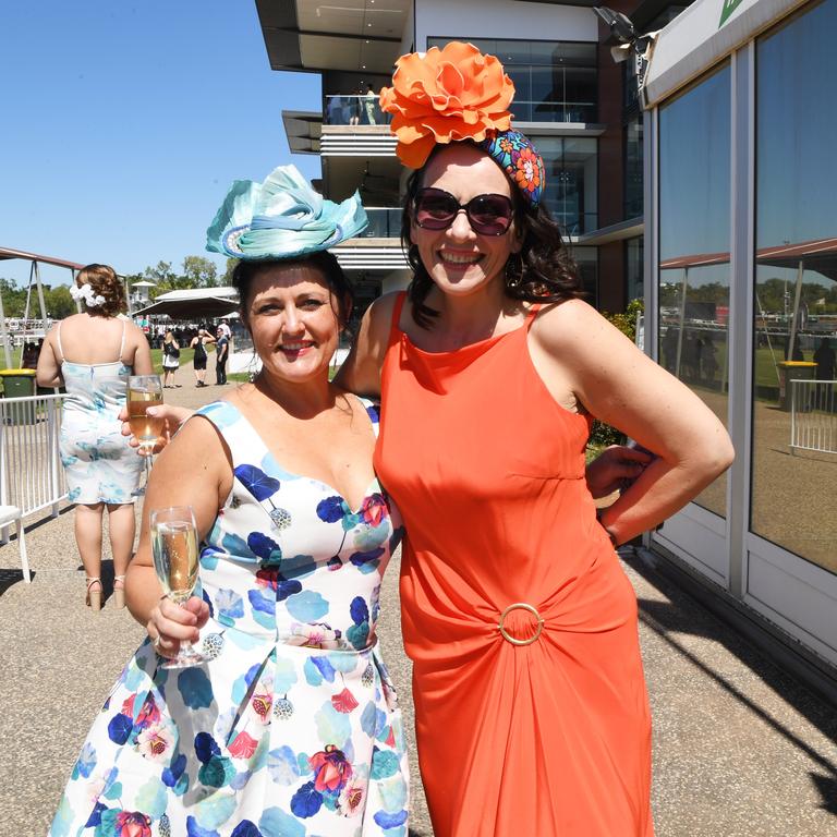 Bec Forrest and Hilly Alcock at the Darwin Turf Club Bridge Toyota Ladies' Day / Derby Day. Picture: KATRINA BRIDGEFORD