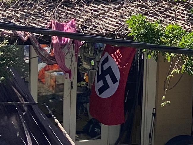 A Nazi swastika flag flies in the backyard of a Newtown home. 21 Watkins Street, Newtown. (supplied)