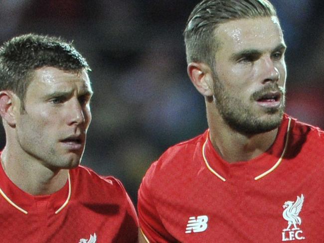 Jordan Henderson and James Milner of Liverpool look on during the international friendly football match between Adelaide United and English Premier League side Liverpool in Adelaide on July 20, 2015. AFP PHOTO / David MARIUZ -- IMAGE STRICTLY RESTRICTED TO EDITORIAL USE - STRICTLY NO COMMERCIAL USE