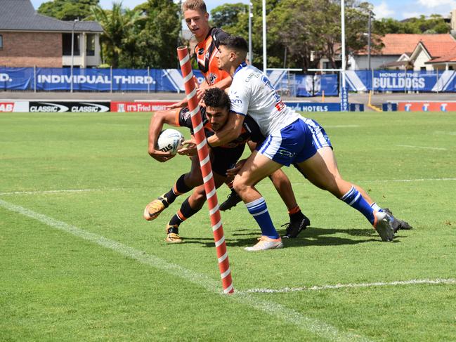 Brenden Naicori is tackled by Michael Gabrael. Picture: Sean Teuma/NewsLocal.