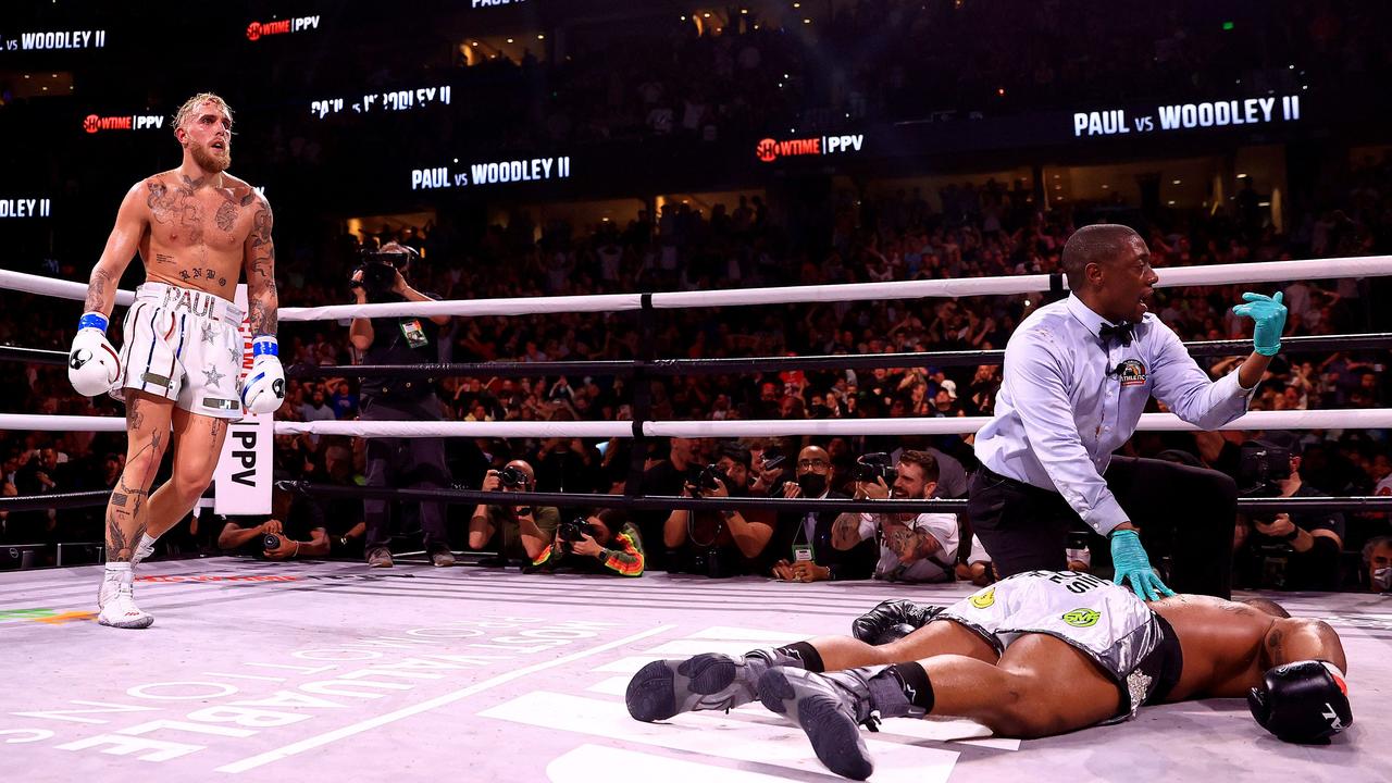 Jake Paul reacts to knocking out Tyron Woodley cold. Photo: Mike Ehrmann/Getty Images/AFP