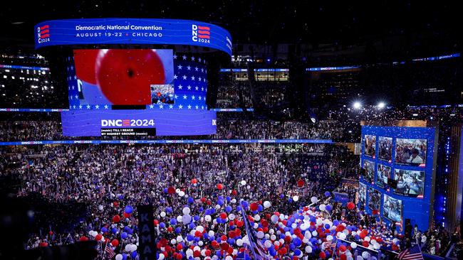 There are thousands of us squished together, toppling over, jostling, hot, uncomfortable, straining under the lights. Picture: Chip Somodevilla/Getty Images/AFP