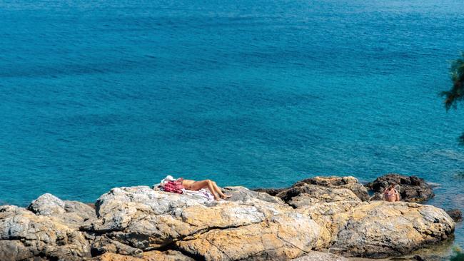 Supine in the sunshine at Dio Liskaria beach on the east coast of Leros. Photography: Thomas Gravanis.