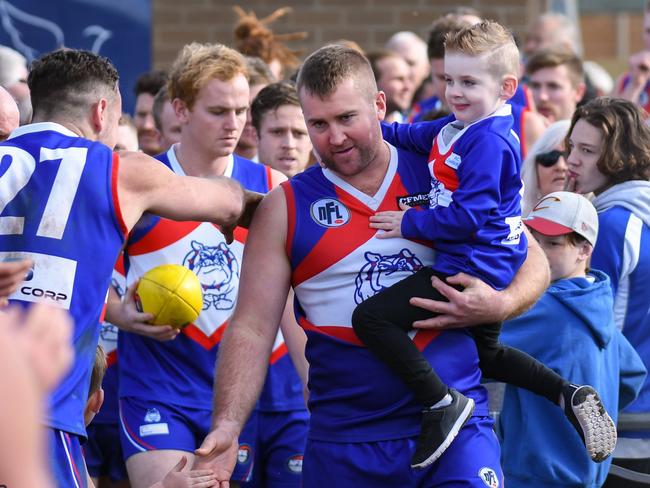 Trent Scannell leads North Heidelberg out for his 300th game. Picture: Nathan William Media