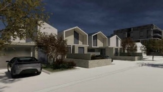 An artist’s impression of four townhouses that will be built on Mallen St.