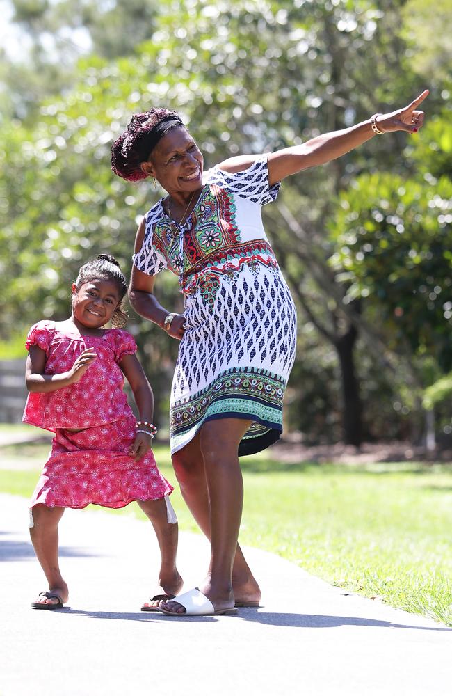 Bindisa Powaseu, 10, with her Mum Betty Terry. Bindisa, known as Bindy, was born with a rare kidney condition that affected her bone development. She’s had surgery at the Queensland Children’s Hospital, which will hopefully result in her legs straightening over time. Picture: Claudia Baxter