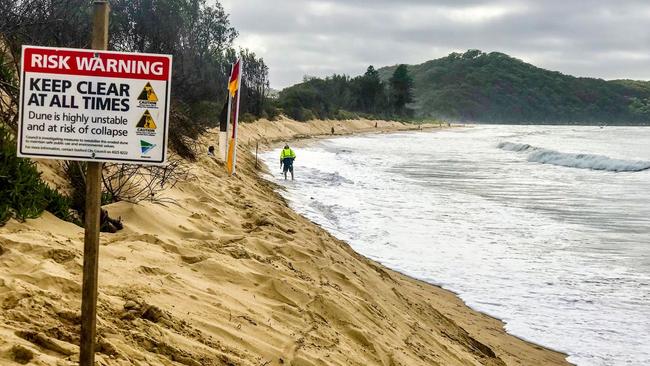 The red and yellow flags were placed at the edge of the dunes beside the car park at high tide. Picture: supplied.