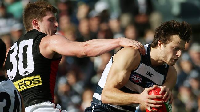 Geelong's Jordan Murdoch outmarks his brother, St Kilda’s Brodie Murdoch, in June 2014. Picture: Colleen Petch