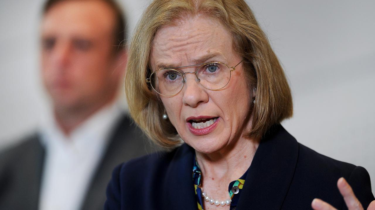 Queensland Chief Health Officer Jeannette Young with Deputy Premier Steven Miles in background during a Covid-19 media briefing. Picture: John Gass