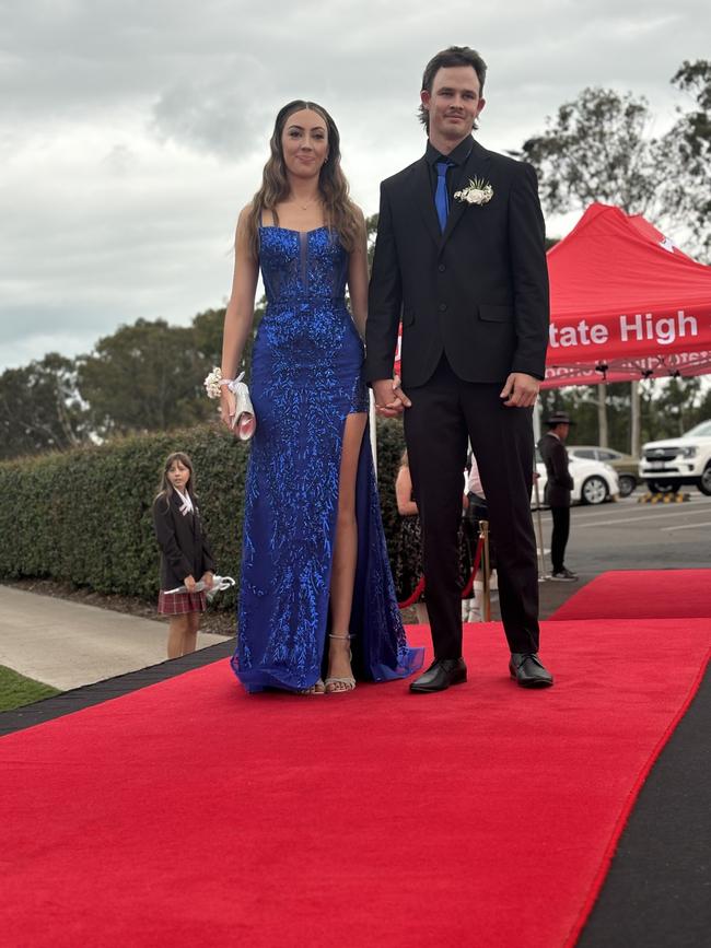 The students of Urangan State High School arriving at their formal.