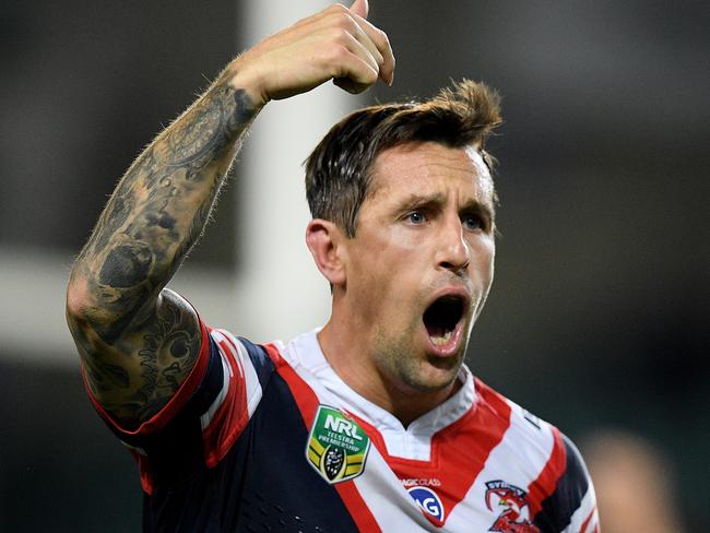 Mitchell Pearce of the Roosters gestures to the sideline during the Round 21 NRL match between the Sydney Roosters and the North Queensland Cowboys at Allianz Stadium in Sydney, Saturday, July 29, 2017. (AAP Image/Dan Himbrechts) NO ARCHIVING, EDITORIAL USE ONLY