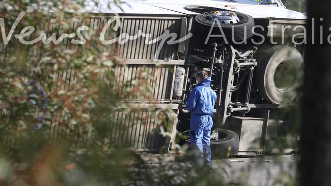 Ten people were killed and others injured when the bus overturned. Picture: John Grainger