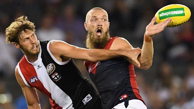 Tom Hickey of the Saints and Max Gawn of the Demons compete in the ruck.
