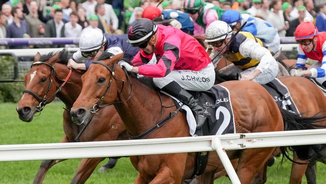 Just Fine (IRE) ridden by Jordan Childs wins the The Lexus Bart Cummings at Flemington Racecourse on October 05, 2024 in Flemington, Australia. (Photo by George Sal/Racing Photos via Getty Images)