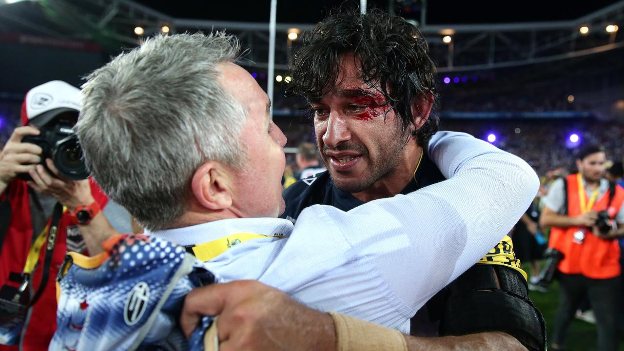 Paul Green celebrates winning the 2016 premiership with Johnathan Thurston.