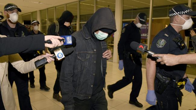 One of the four train stowaways at Adelaide Airport after walking out of court without penalty. Picture: NCA NewsWire / Naomi Jellicoe