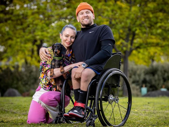 Wheelchair tennis champion Dylan Alcott with girlfriend Chantelle Otten and their dog Sauce. Picture: Jake Nowakowski