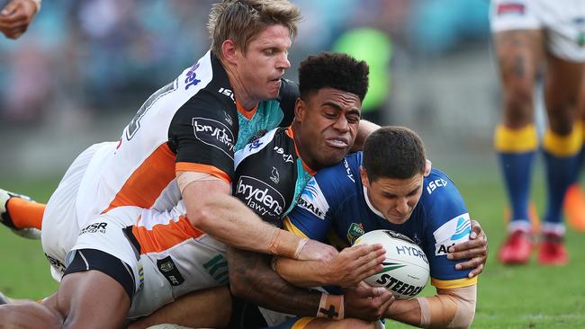 Chris Lawrence and Kevin Naiqama are all over Mitchell Moses. (Phil Hillyard)