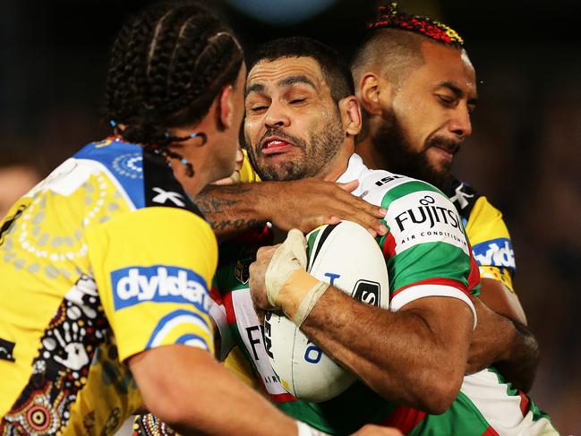 South Sydney's Greg Inglis is tackled during the Parramatta Eels v South Sydney rugby league game at Pirtek Stadium, Parramatta. Pic Brett Costello