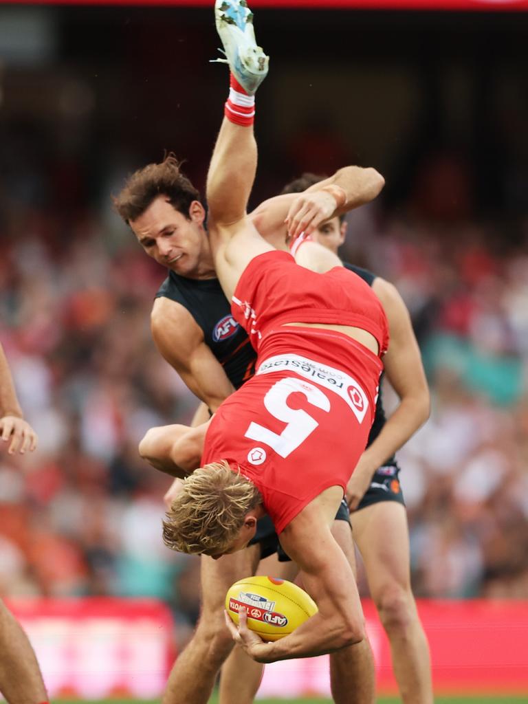 Heeney comes back to earth after taking a screamer over Jack Buckley. Picture: Matt King/AFL Photos/via Getty Images