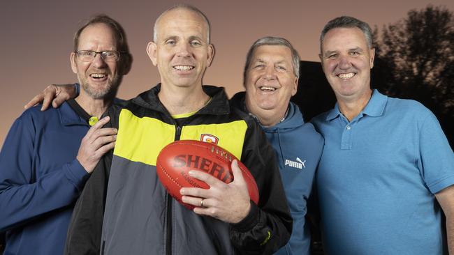 Corey Bowen (second from left), who will umpire his 400th SANFL game on Sunday, alongside the SANFL’s other 400-game field umpires, from left, Tim Pfeiffer, Laurie Argent and Richard Williams. Picture: Brett Hartwig