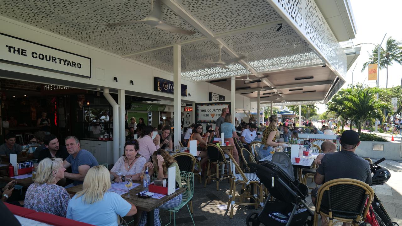 Cafes and restaurants along the Cairns Esplanade experiencing an influx in foot traffic from the Ironman event. Photo: Georgia Clelland.