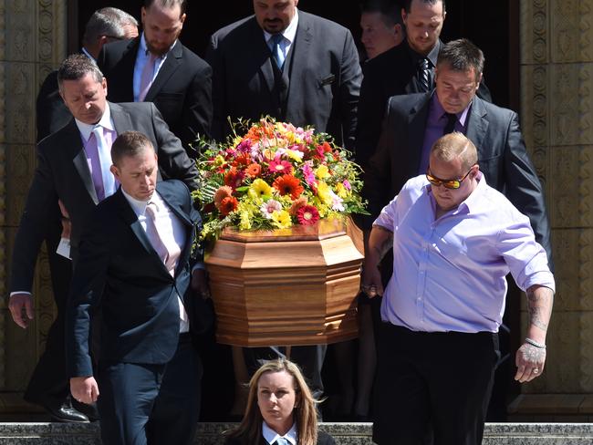Kate Goodchild’s coffin is carried from St Christopher's Cathedral. (AAP Image/Lukas Coch)