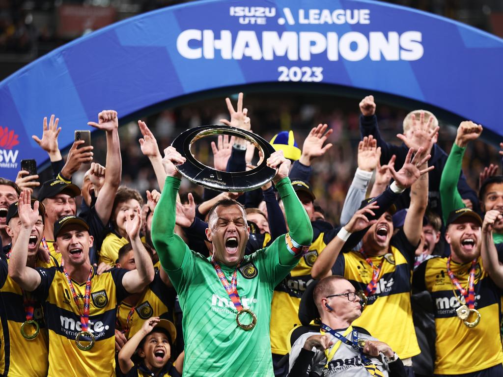 The ultimate prize: Daniel Vukovic of The Central Coast Mariners celebrates winning the 2023 A-League Men's Grand Final match against Melbourne City at Sydney’s CommBank Stadium on June 3. Picture: Matt King/Getty Images