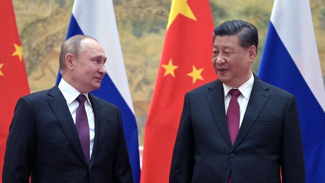 Grievance politics: Vladimir Putin and Xi Jinping in Beijing on February 4. Picture: AFP