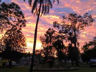 GLORIOUS: The sunrise captured over Memorial Park as the Growers Markets begin to to set up. Picture: Frances Klein