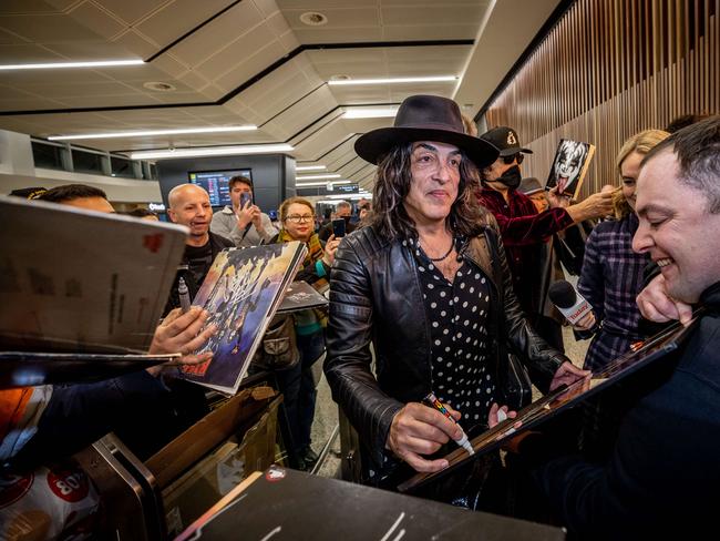 Paul Stanley signs autographs for fans upon arrival at Melbourne Airport to begin the Australian leg of the End of the Road Tour. Picture: Jake Nowakowski