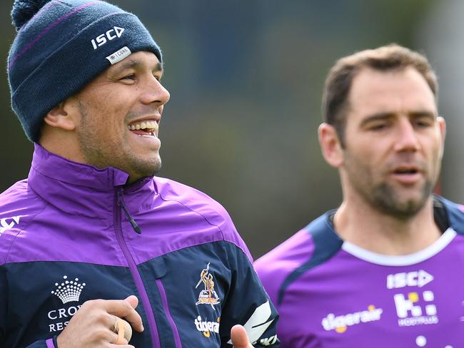 Will Chambers (left) and Cameron Smith of the Melbourne Storm are seen training at Gosch's Paddock in Melbourne, Monday, September 18, 2017. Melbourne Storm play the Brisbane Broncos in an NRL preliminary grand final on Friday. (AAP Image/Julian Smith) NO ARCHIVING