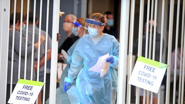 Health workers at a pop up COVID-19 testing centre in Bundamba. Picture: John Gass