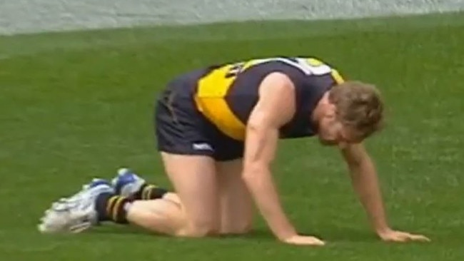 A video still that shows Shane Tuck after one of the hits he took during his AFL career.