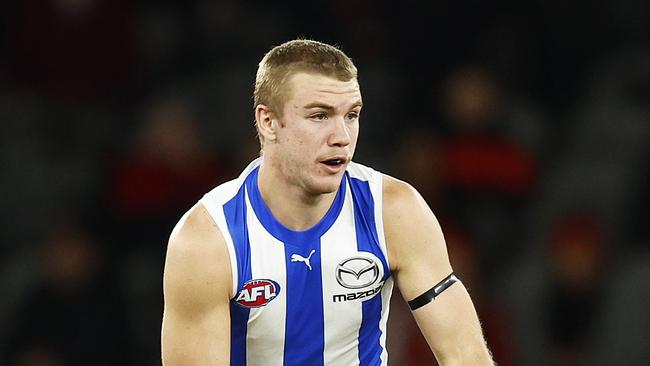 MELBOURNE, AUSTRALIA - JULY 31: Jason Horne-Francis of the Kangaroos kicks the ball during the round 20 AFL match between the Essendon Bombers and the North Melbourne Kangaroos at Marvel Stadium on July 31, 2022 in Melbourne, Australia. (Photo by Daniel Pockett/Getty Images)