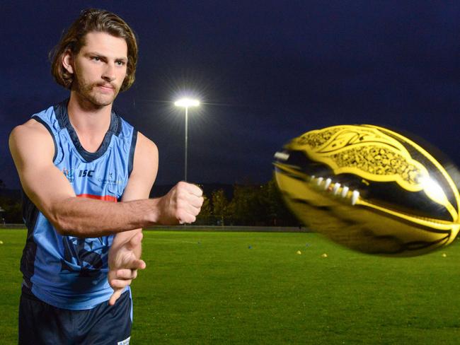 Sturt player Josh Patullo with a multicultural football at Unley Oval, Monday, May 27, 2019. SANFL will be using the ball for the game between Sturt and Central District. (Pic: Brenton Edwards)