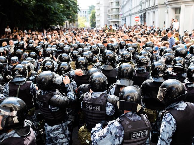 Cordoned Riot police officers cordon protesters off as Muscovites gather to demand free registration of opposition politicians for city parliament elections July 27, 2019 Credit: Evgeny Feldman