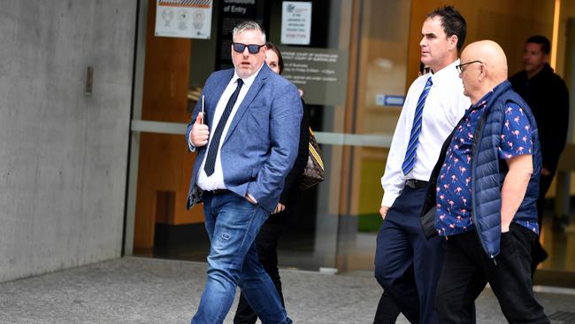 Senior constables Jason Mole and Dylan Johnston (white shirt) leave the Supreme Court in Brisbane. Picture: NCA NewsWire / John Gass