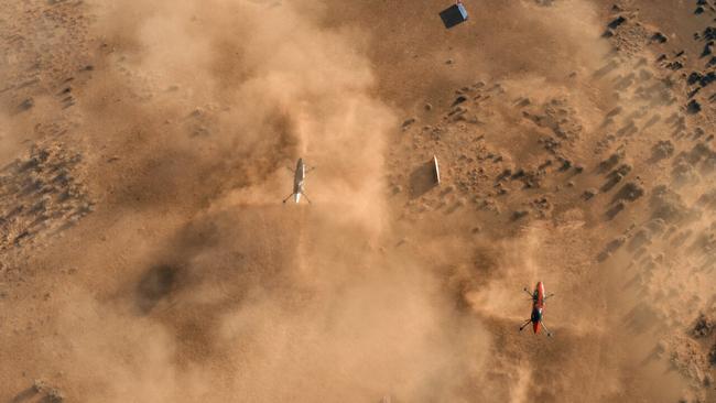 The flying cars raise huge amounts of dust during the race. Picture: Airspeeder