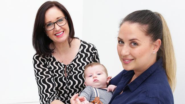 Safety advocate Kerryn O’Brien and Jessica Jenkins with her four-month-old son, Angus Greensill. Picture: AAP/Claudia Baxter