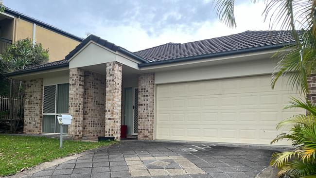 The ordinary looking Gold Coast home that the Australian Federal Police raided multiple times.