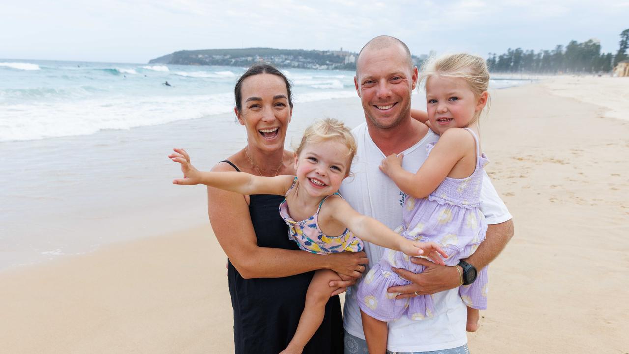 Ryan and Kate Middlebrook with daughters Mila and Hallie, said the comparatively cheaper Manly Vale area has offered a good beach lifestyle . Picture: David Swift