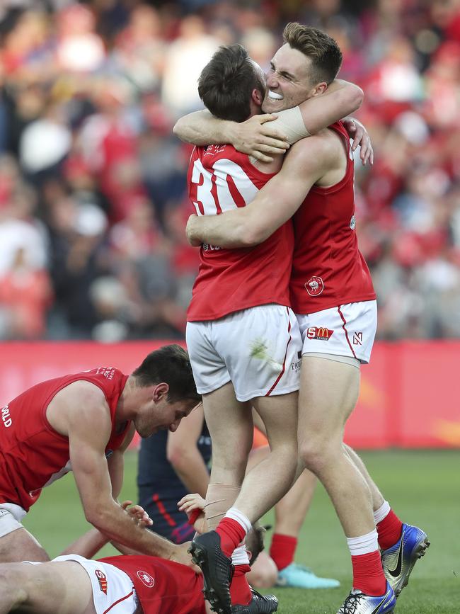 Brock Castree (right) celebrates with captain Max Thring following the final siren of the 2018 SANFL grand final. Picture: Sarah Reed