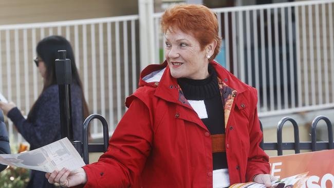 One Nation senator Pauline Hanson handing out how to vote cards for the party at Lansdowne Crescent Primary School in West Hobart. Picture: Nikki Davis-Jones