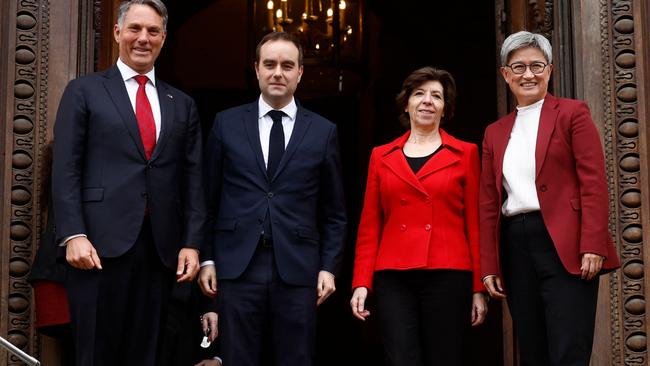 (From L) Australian Defence Minister Richard Marles, French Armies Minister Sebastien Lecornu, French Foreign and European Affairs Minister Catherine Colonna and Australian Foreign Minister Penny Wong pose prior their joint meeting at Quai dâOrsay in Paris, on January 30, 2023. (Photo by Yoan VALAT / POOL / AFP)