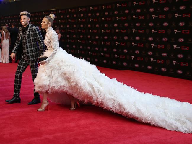 MELBOURNE, AUSTRALIA - SEPTEMBER 24:  Jason Johannisen of the Bulldogs and his partner Logan Shine arrive ahead of the 2018 Brownlow Medal at Crown Entertainment Complex on September 24, 2018 in Melbourne, Australia.  (Photo by Scott Barbour/Getty Images)