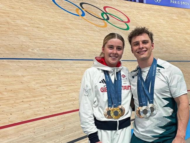 British track cyclist Emma Finucane and Australian track cyclist Matt Richardson pose with their medals at the conclusion of the Paris Olympic Games.