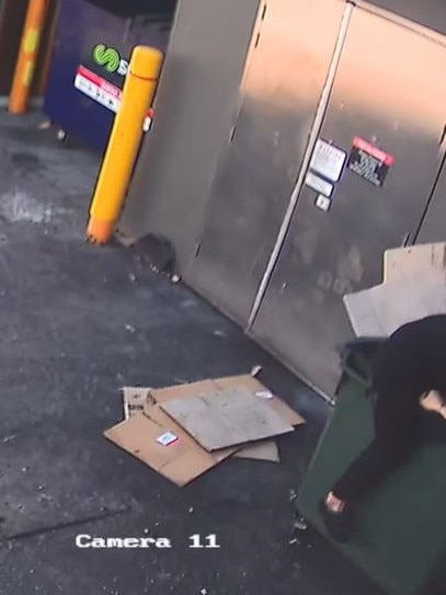 One of the men hide in a bin at a fast food restaurant. Picture: VicPol