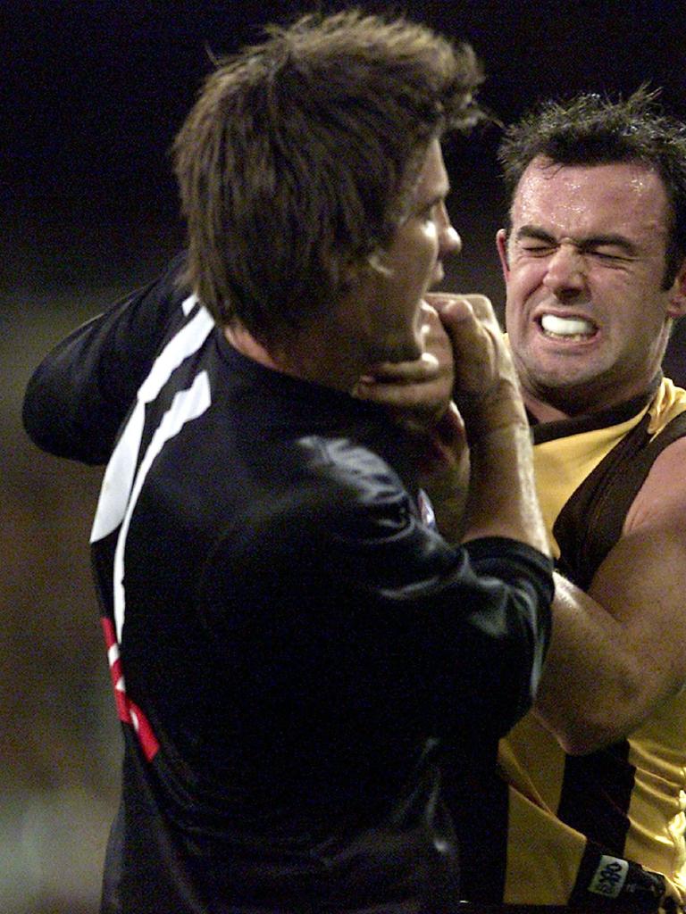 Harford clashes with Carlton’s Simon Fletcher in 2002.